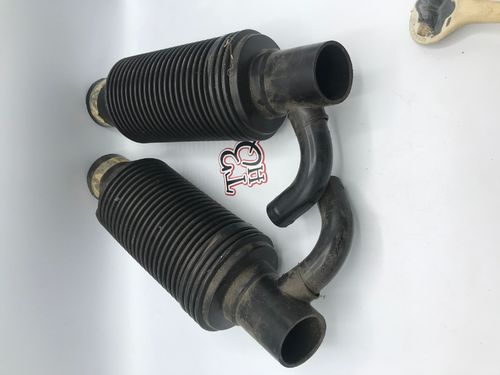 Pair of early dampers (below rear seat), used condition